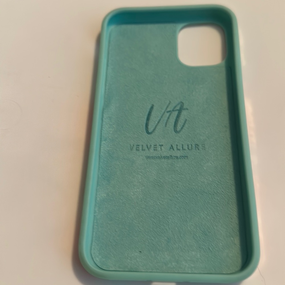 iPhone 11 only case. Mint color with flowers. Great condition.